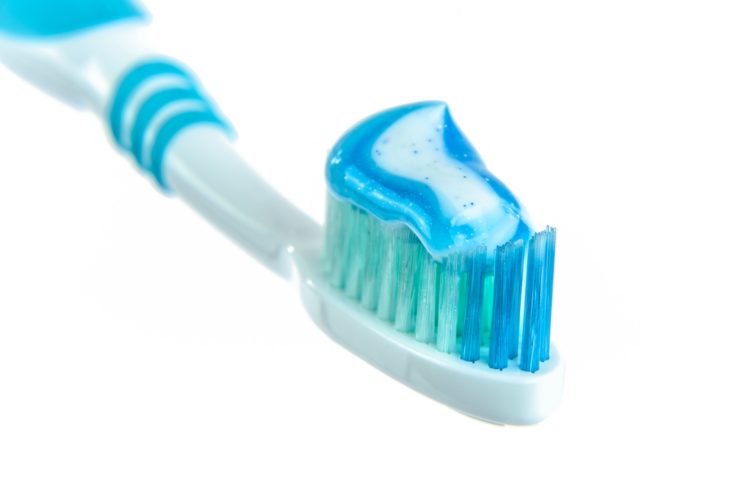 Soft bristle toothbrush and toothpaste for sensitive teeth